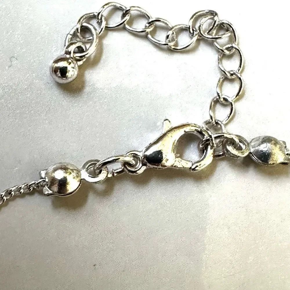 Silver tone shell charm bracelet - Picture 3 of 5